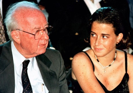 - FILE PHOTO - Noa Ben-Artzi Philosof looks towards her grandfather, Prime Minister Yitzhak Rabin, as they sit in the audience of an international fashion show organised to support the peace process put on in March 1995. Noa delivered a tearful eulogy at her grandfather's funeral service November 6 when the assassinated Israeli prime minister was buried on Mt. Herzl military cemetery in the prescence of many of the world's leaders. ?? OUT - RTXFLRK
