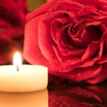 Candela con rosa