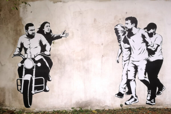 Murale di aleXsandro Palombo su Noa Argamani e Avinatan Or